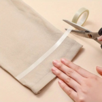 Dubbelzijdige Kleefstrip voor Stof/Kleding - Rol 5mx10mm - Wit - Gemakkelijke Naadloze Zoomstrip - Waterdicht - Strijkvrij - Broek en Kleding Zoomstrip